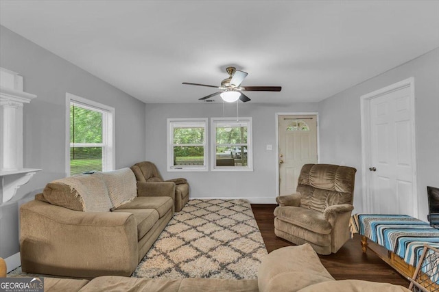 342 Chevis Rd, Savannah, GA 31419 - living room with ceiling fan, dark wood-style flooring, and baseboards