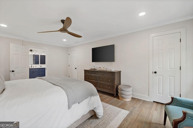 2885 Laurel Green Ct, Roswell, GA 30076 - bedroom featuring recessed lighting, light wood-style flooring, crown molding, a sink, and connected bathroom