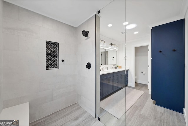 2885 Laurel Green Ct, Roswell, GA 30076 - full bathroom featuring walk in shower, double vanity, wood finished floors, and toilet