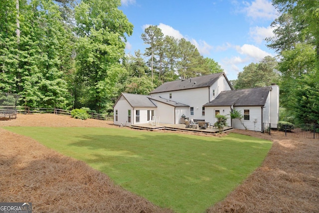 2885 Laurel Green Ct, Roswell, GA 30076 - rear view of house with a deck and a chimney