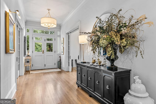 766 E Ave, Madison, GA 30650 - entrance foyer featuring ornamental molding and light wood-type flooring