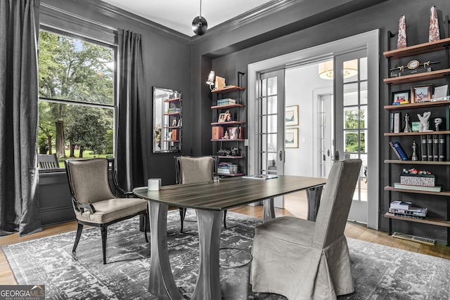 766 E Ave, Madison, GA 30650 - home office with light wood-style floors and crown molding