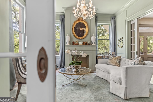 766 E Ave, Madison, GA 30650 - living area featuring a chandelier and ornamental molding