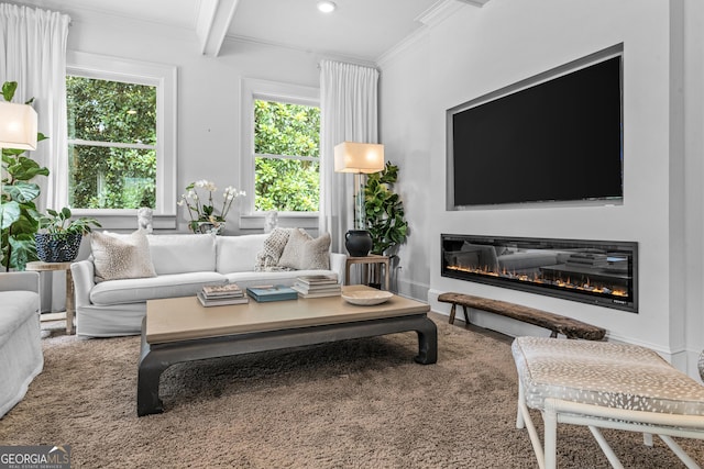 766 E Ave, Madison, GA 30650 - living room featuring crown molding, a glass covered fireplace, recessed lighting, and beam ceiling