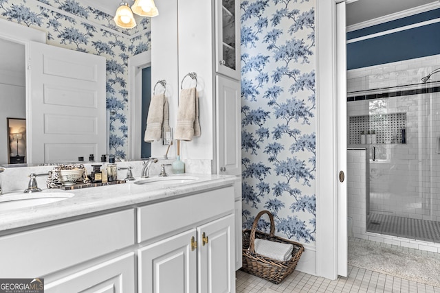 766 E Ave, Madison, GA 30650 - bathroom with wallpapered walls, a stall shower, double vanity, and tile patterned floors