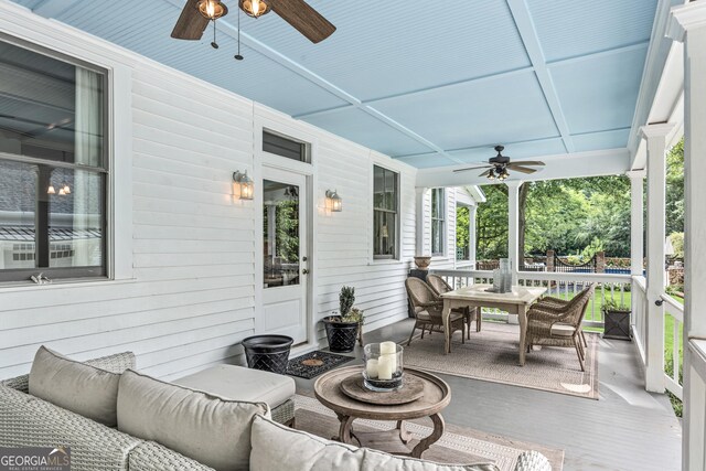 766 E Ave, Madison, GA 30650 - wooden deck with ceiling fan, an outdoor hangout area, and outdoor dining space