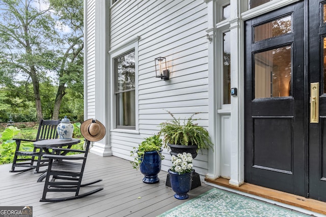 766 E Ave, Madison, GA 30650 - doorway to property featuring a deck