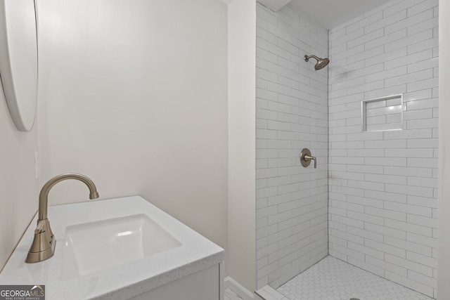 1124 Ponderosa Park Dr, Forest Park, GA 30297 - bathroom featuring a tile shower and vanity