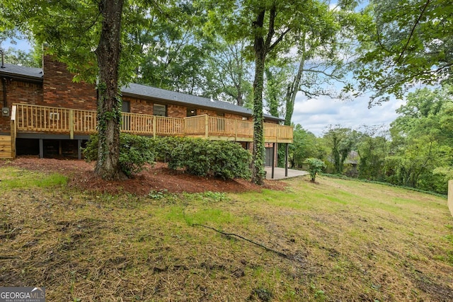 1124 Ponderosa Park Dr, Forest Park, GA 30297 - view of grassy yard with a wooden deck