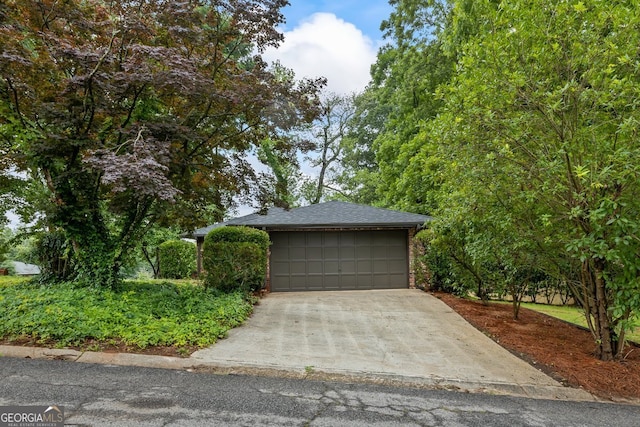 1124 Ponderosa Park Dr, Forest Park, GA 30297 - garage featuring driveway