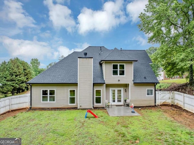 3190 Water Brook Dr SW, Conyers, GA 30094 - rear view of house featuring a patio, a chimney, a shingled roof, a gate, and french doors