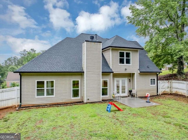 3190 Water Brook Dr SW, Conyers, GA 30094 - rear view of property with a chimney, a patio area, and roof with shingles