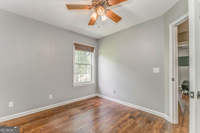200 Wildwood, Calhoun, GA 30701 - empty room featuring wood-type flooring, baseboards, and a ceiling fan