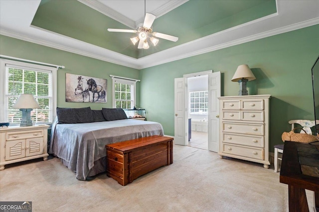 40 Costleys Bridge Dr, Oxford, GA 30054 - bedroom with a raised ceiling, light carpet, crown molding, connected bathroom, and ceiling fan