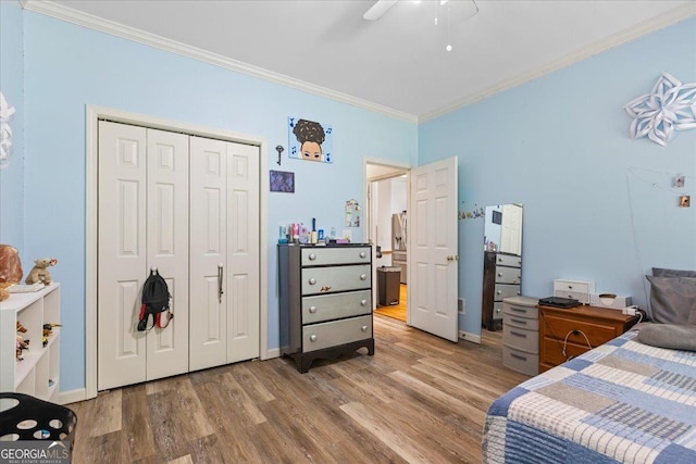 40 Costleys Bridge Dr, Oxford, GA 30054 - bedroom featuring crown molding, wood finished floors, a closet, baseboards, and ceiling fan