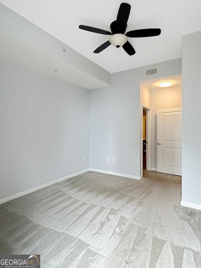 3040 Peachtree Rd Unit 1501, Atlanta, GA 30305 - carpeted spare room with a ceiling fan and baseboards