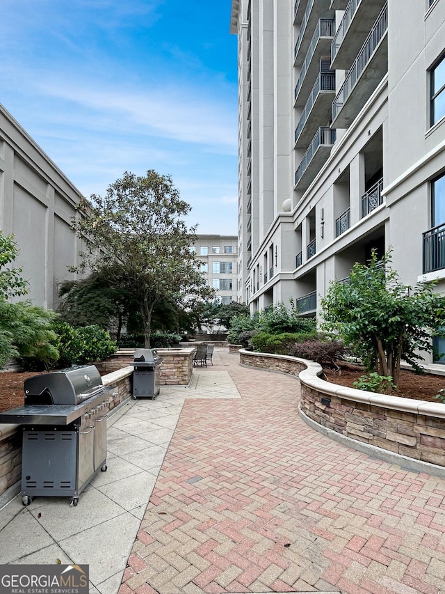 3040 Peachtree Rd Unit 1501, Atlanta, GA 30305 - view of home's community with a patio