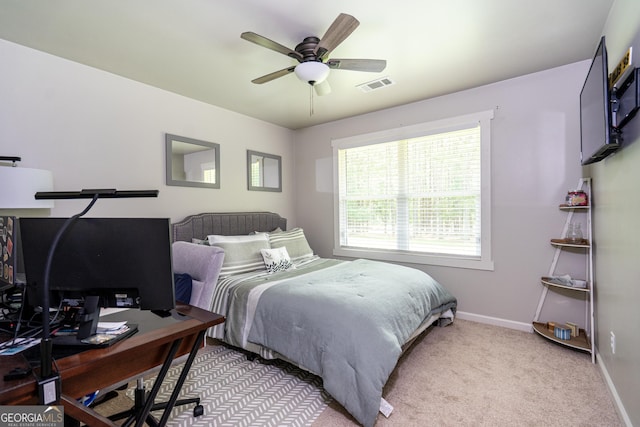 101 Crestwood Dr, Lagrange, GA 30241 - bedroom with baseboards, a desk, light colored carpet, and a ceiling fan