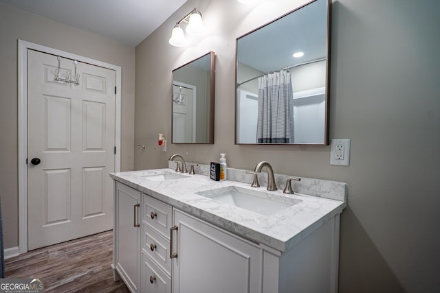 101 Crestwood Dr, Lagrange, GA 30241 - full bath featuring double vanity and wood finished floors