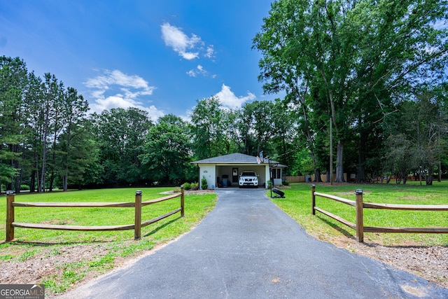 101 Crestwood Dr, Lagrange, GA 30241 - view of front of house featuring driveway and a wooded view
