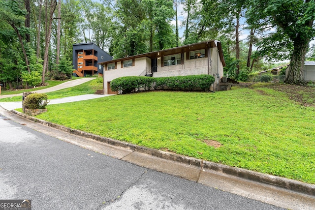 900 Fleetwood Cir SW, Atlanta, GA 30311 - view of front of property featuring a front lawn and concrete driveway