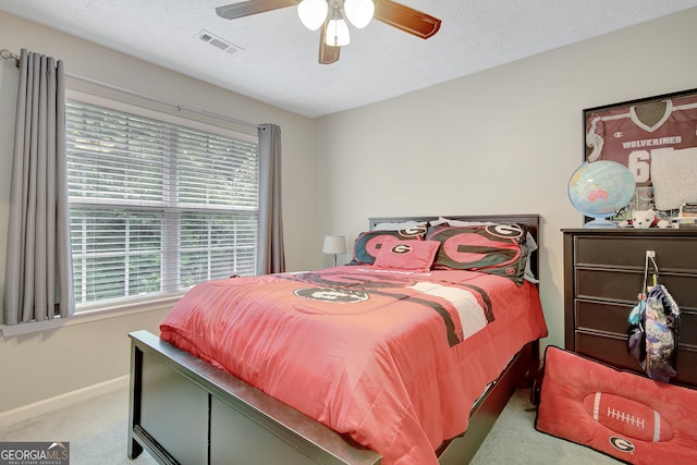 17 Roxbury Ln, Newnan, GA 30265 - bedroom with carpet flooring, multiple windows, baseboards, and a ceiling fan