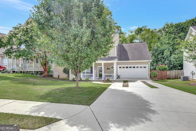 17 Roxbury Ln, Newnan, GA 30265 - obstructed view of property with a garage, cooling unit, driveway, and covered porch