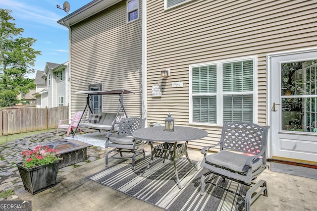 17 Roxbury Ln, Newnan, GA 30265 - view of patio featuring a fire pit