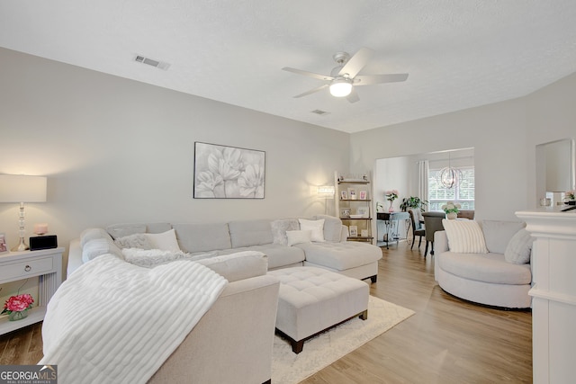 17 Roxbury Ln, Newnan, GA 30265 - living room with ceiling fan and light wood finished floors