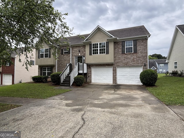 4069 Savannah Ridge Ct, Loganville, GA 30052 - bi-level home featuring brick siding, a front yard, an attached garage, concrete driveway, and roof with shingles