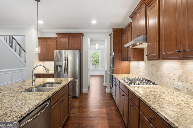 7139 Lake Edge Dr, Flowery Branch, GA 30542 - kitchen with stainless steel appliances, under cabinet range hood, light stone countertops, dark wood-style flooring, and backsplash