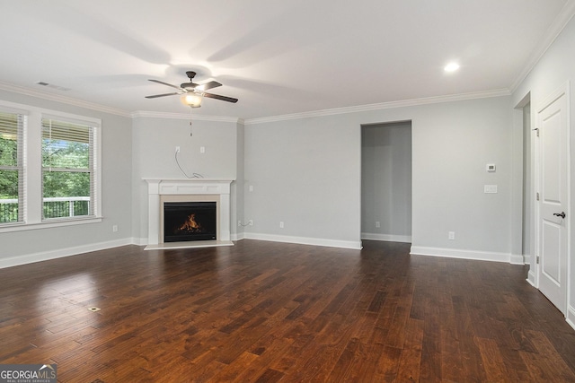 7139 Lake Edge Dr, Flowery Branch, GA 30542 - unfurnished living room with a ceiling fan, dark wood finished floors, a lit fireplace, and ornamental molding