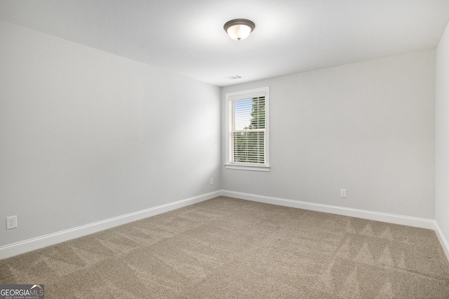 7139 Lake Edge Dr, Flowery Branch, GA 30542 - carpeted empty room featuring baseboards