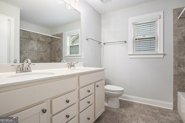 7139 Lake Edge Dr, Flowery Branch, GA 30542 - bathroom featuring double vanity, a tile shower, and a bathtub