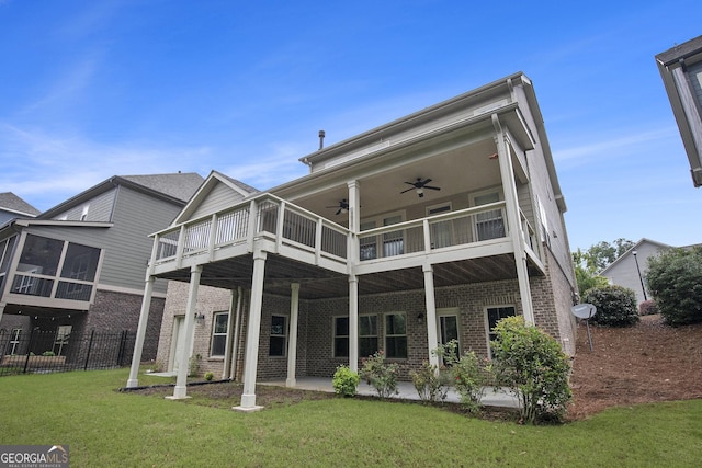 7139 Lake Edge Dr, Flowery Branch, GA 30542 - back of property with a ceiling fan, brick siding, a sunroom, and a patio area