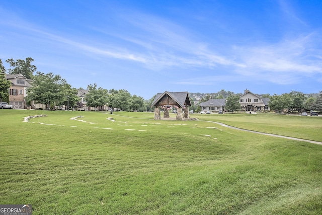 7139 Lake Edge Dr, Flowery Branch, GA 30542 - view of home's community featuring a lawn