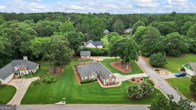 15 Livingston Way, Covington, GA 30016 - aerial view of property and surrounding area with a heavily wooded area