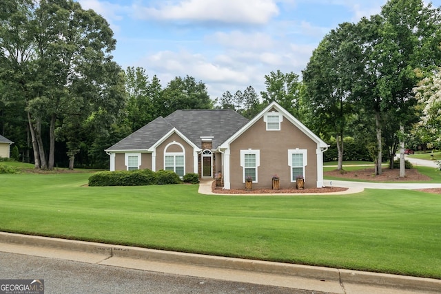 15 Livingston Way, Covington, GA 30016 - view of front of house featuring a front lawn and stucco siding
