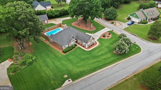 15 Livingston Way, Covington, GA 30016 - aerial view of property and surrounding area featuring a pool
