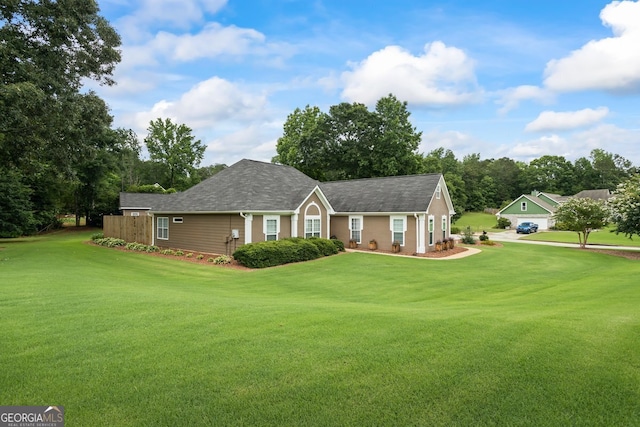 15 Livingston Way, Covington, GA 30016 - single story home featuring a front lawn