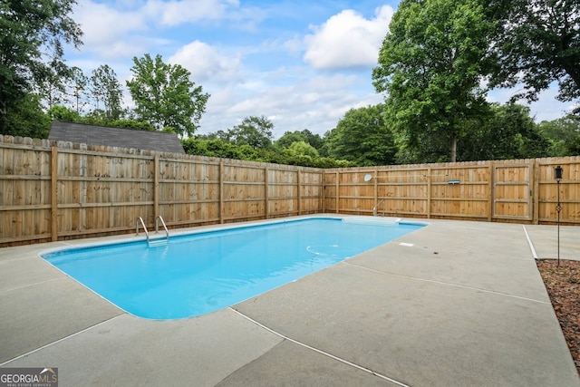 15 Livingston Way, Covington, GA 30016 - view of pool with a fenced backyard and a patio
