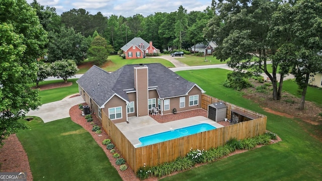 15 Livingston Way, Covington, GA 30016 - rear view of house featuring a chimney and cooling unit