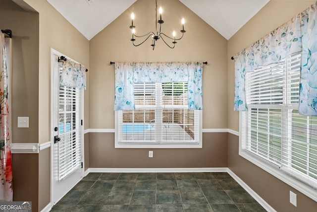 15 Livingston Way, Covington, GA 30016 - unfurnished dining area with lofted ceiling, a chandelier, and baseboards