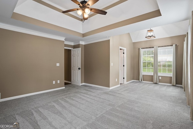 15 Livingston Way, Covington, GA 30016 - carpeted empty room with a raised ceiling, ceiling fan, baseboards, and ornamental molding