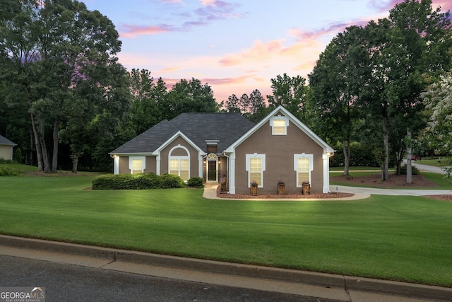 15 Livingston Way, Covington, GA 30016 - view of front facade with a front lawn