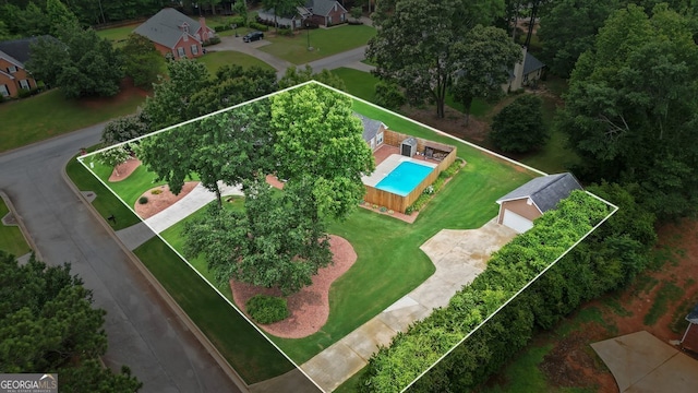 15 Livingston Way, Covington, GA 30016 - aerial overview of property's location with a pool area and property boundaries highlighted