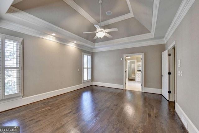 10125 Brixton Pl, Suwanee, GA 30024 - empty room with a raised ceiling, ceiling fan, wood finished floors, baseboards, and ornamental molding