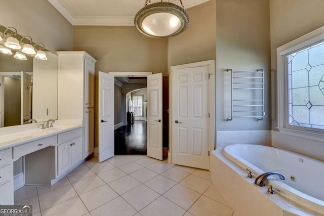 10125 Brixton Pl, Suwanee, GA 30024 - bathroom with radiator heating unit, ornamental molding, a tub with jets, vanity, and tile patterned floors