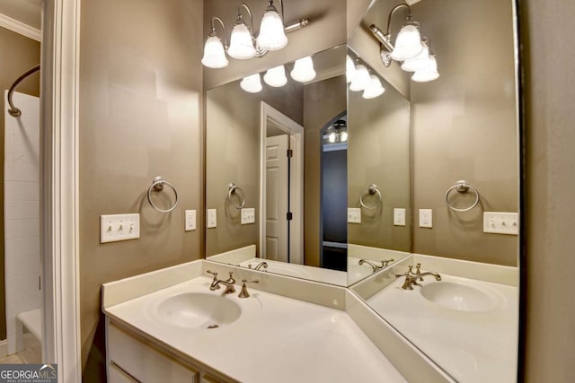 10125 Brixton Pl, Suwanee, GA 30024 - full bath featuring double vanity and crown molding