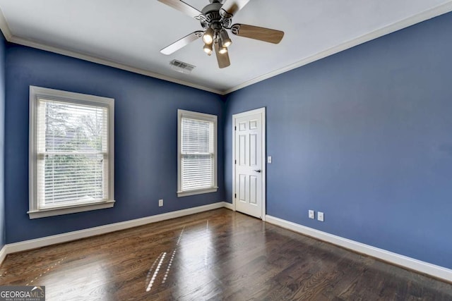 10125 Brixton Pl, Suwanee, GA 30024 - spare room with baseboards, crown molding, wood finished floors, and a ceiling fan